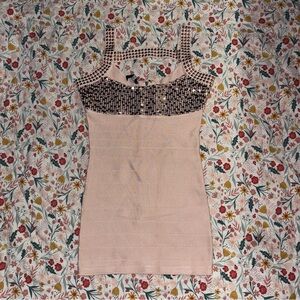 Bebe light pink mini dress with studs and sequins. Size M.